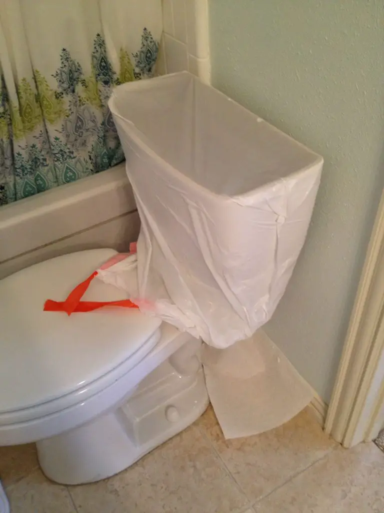 covering toilet tank before painting