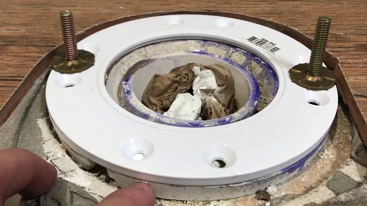 how to install toilet flange extender